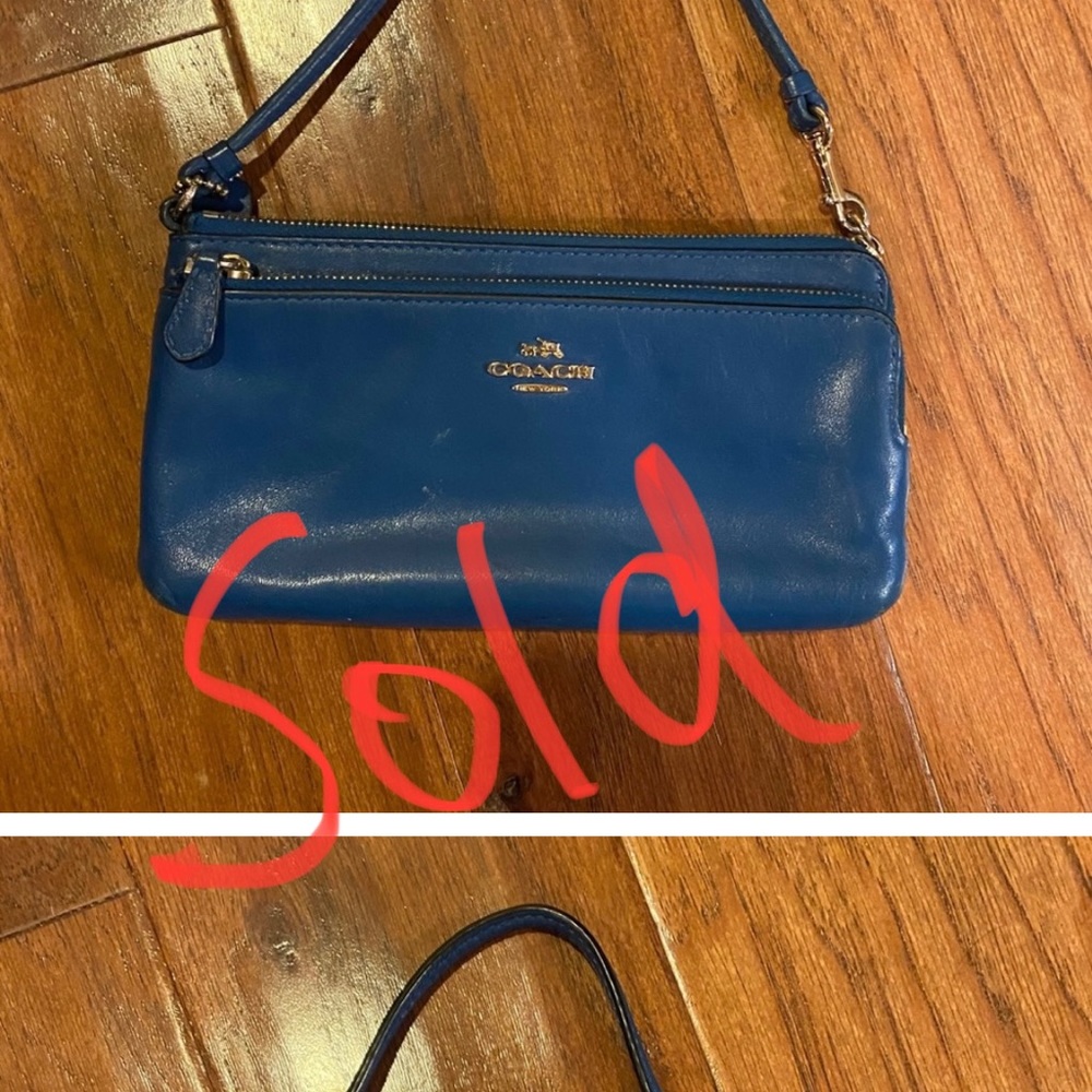 Authentic Coach wristlet. Royal blue leather